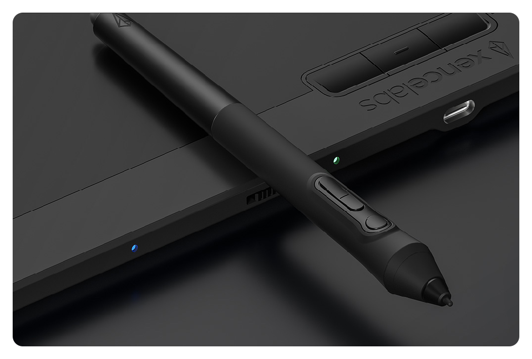 close up of the 3 button pen resting on the tablet, Xencelabs Pen Tablet Medium Education Pack